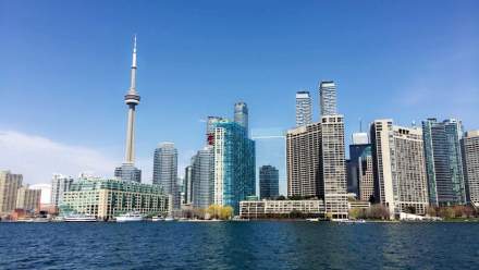 Spectacular view of Toronto's skyline and the CN Tower on a clear day.