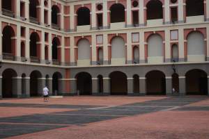 Explore the historic colonial architecture in a vibrant San Juan square, Puerto Rico.